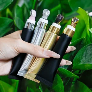 Private Label No Logo 20g Color Changing Plumping Lip Oil, Squeeze Tube with Zinc Alloy Massage Tip for Dudu Lips